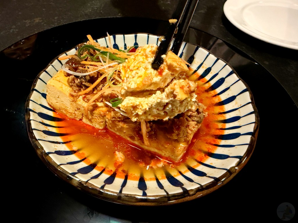 吸滿湯汁香氣濃郁的清蒸臭豆腐特寫